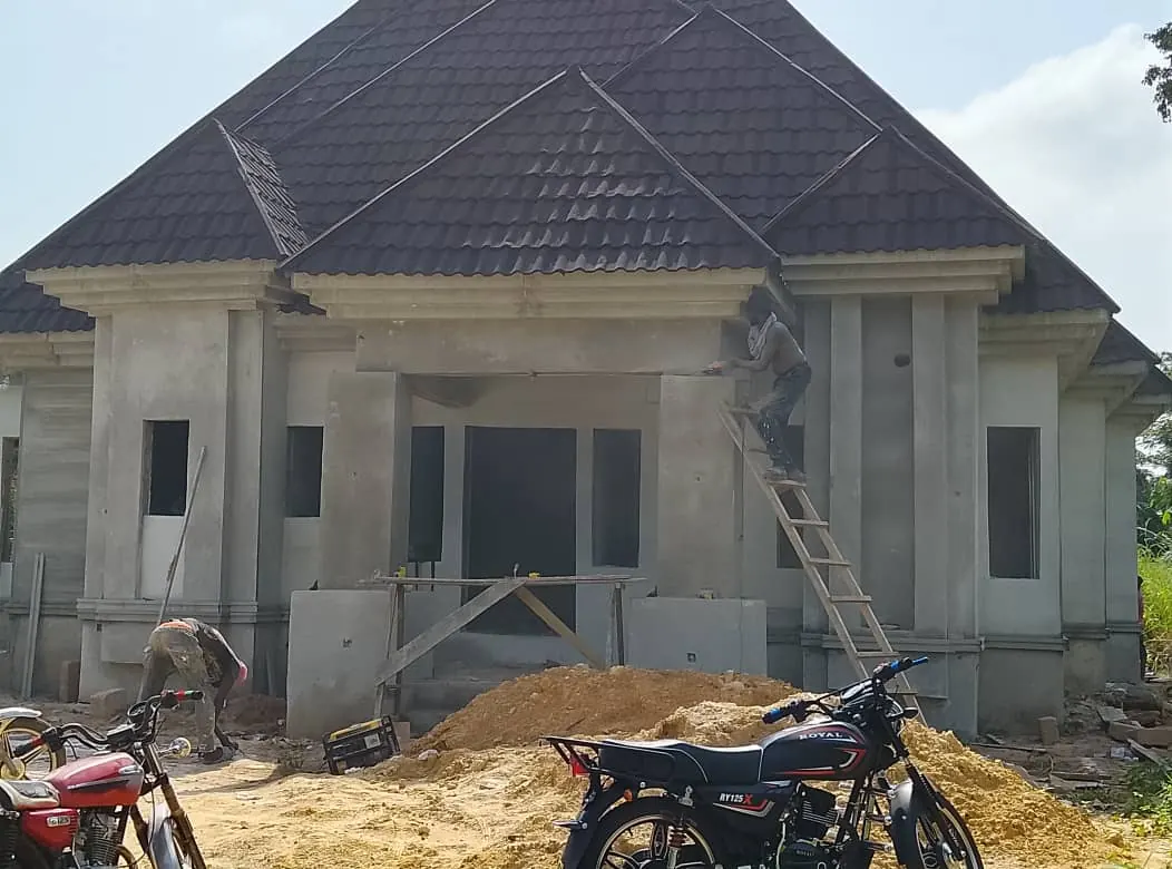 Client-supplied photograph of a residential building exterior.